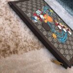 Replica Gucci x Disney Donald Duck Pouch Bag 8